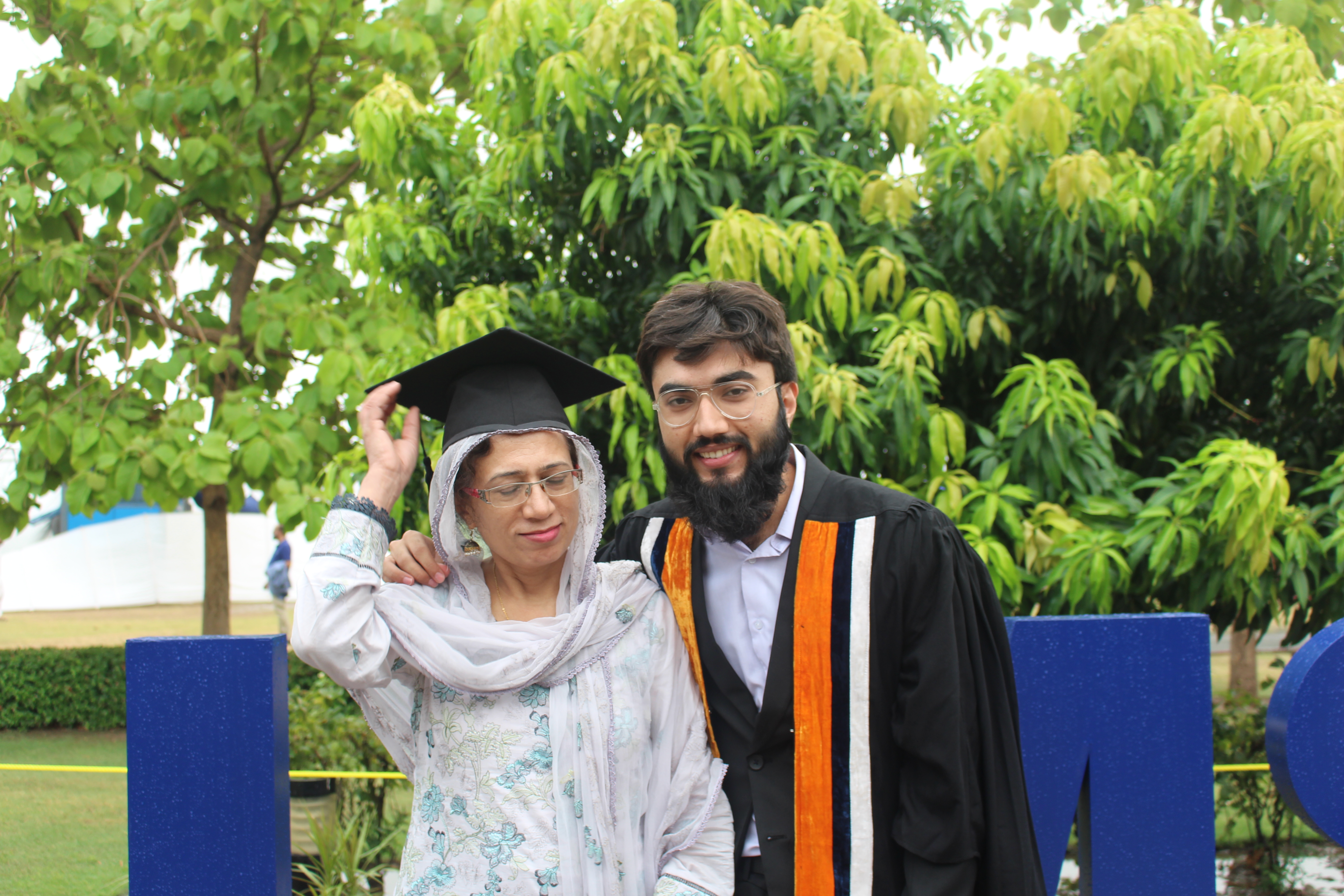 Abdul Basit Pawar with his mother at his graduation ceremony